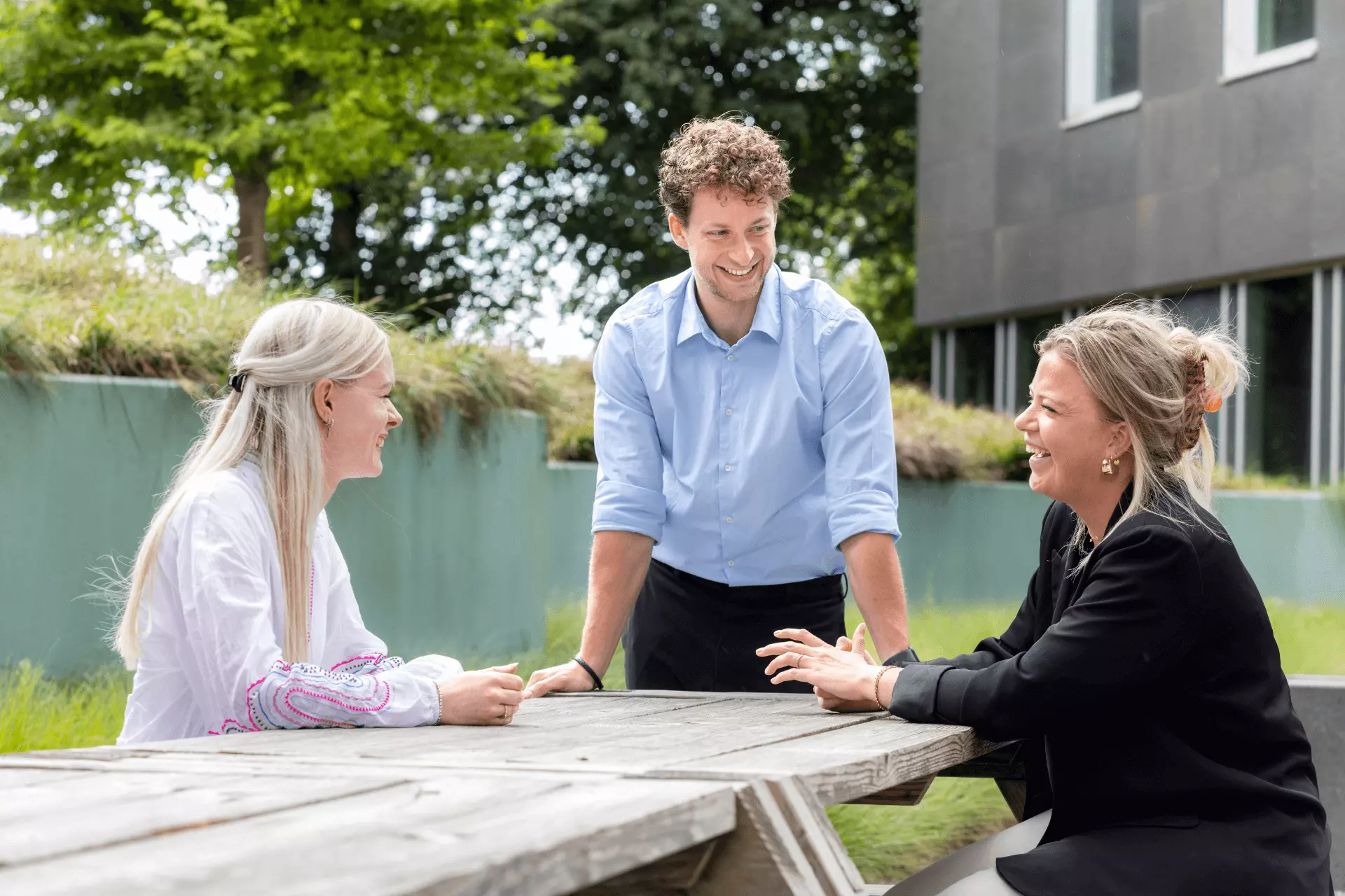 People standing around with drinks